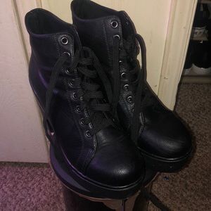Black heeled/platformed booties
